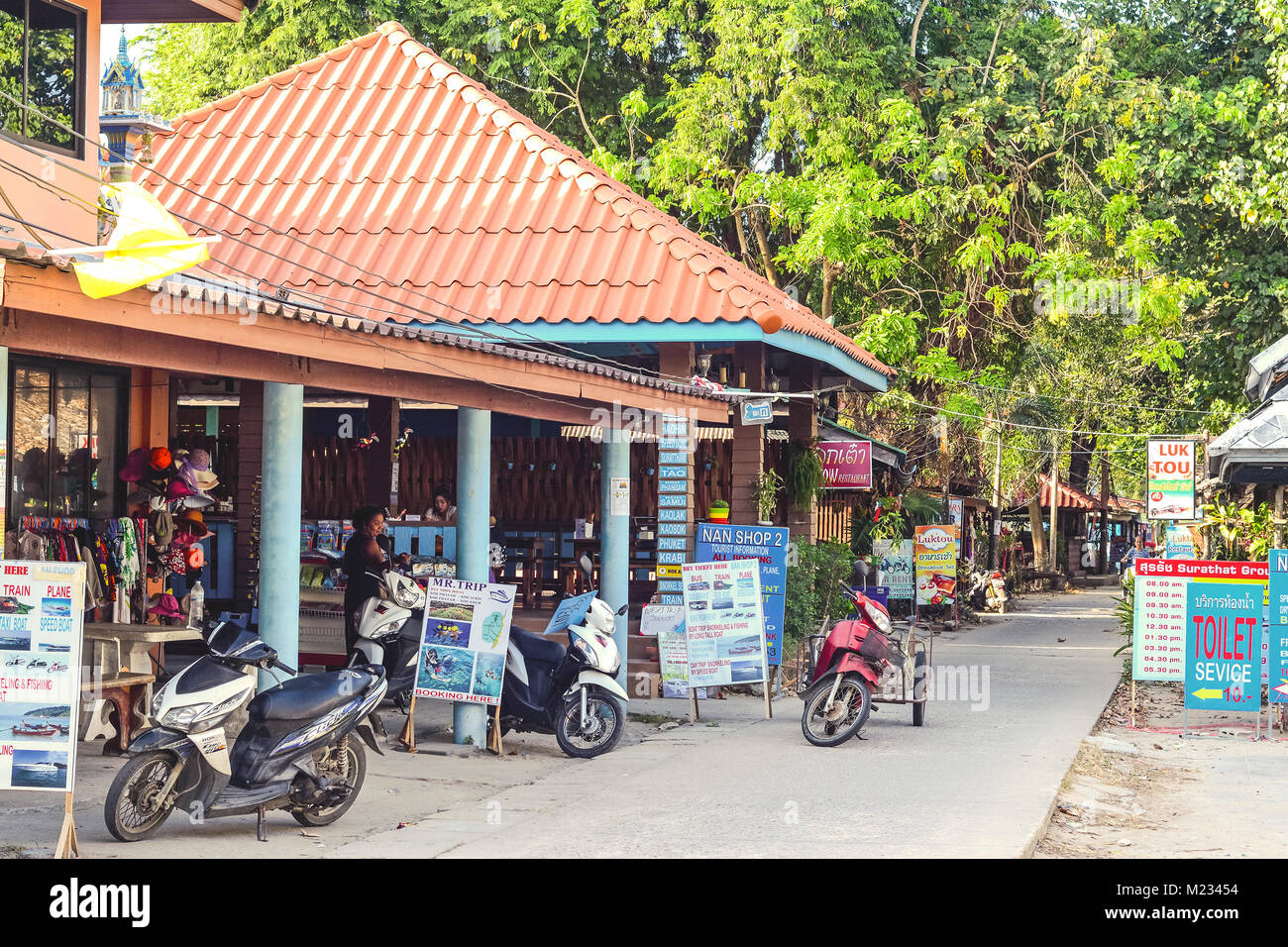 Koh Phayam, Thailand - January 10, 2016: Local shops in center of Koh Phayam, Thailand, a relaxed touristic island, in the Andaman sea, during the hig Stock Photo