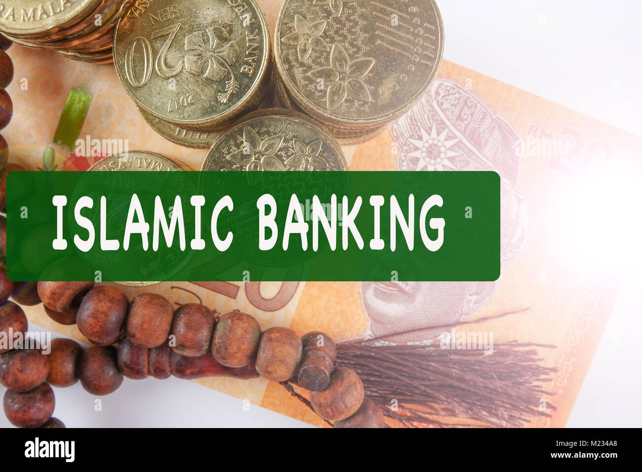 Rosary and coins. Islamic Banking/Finance concept Stock Photo Alamy