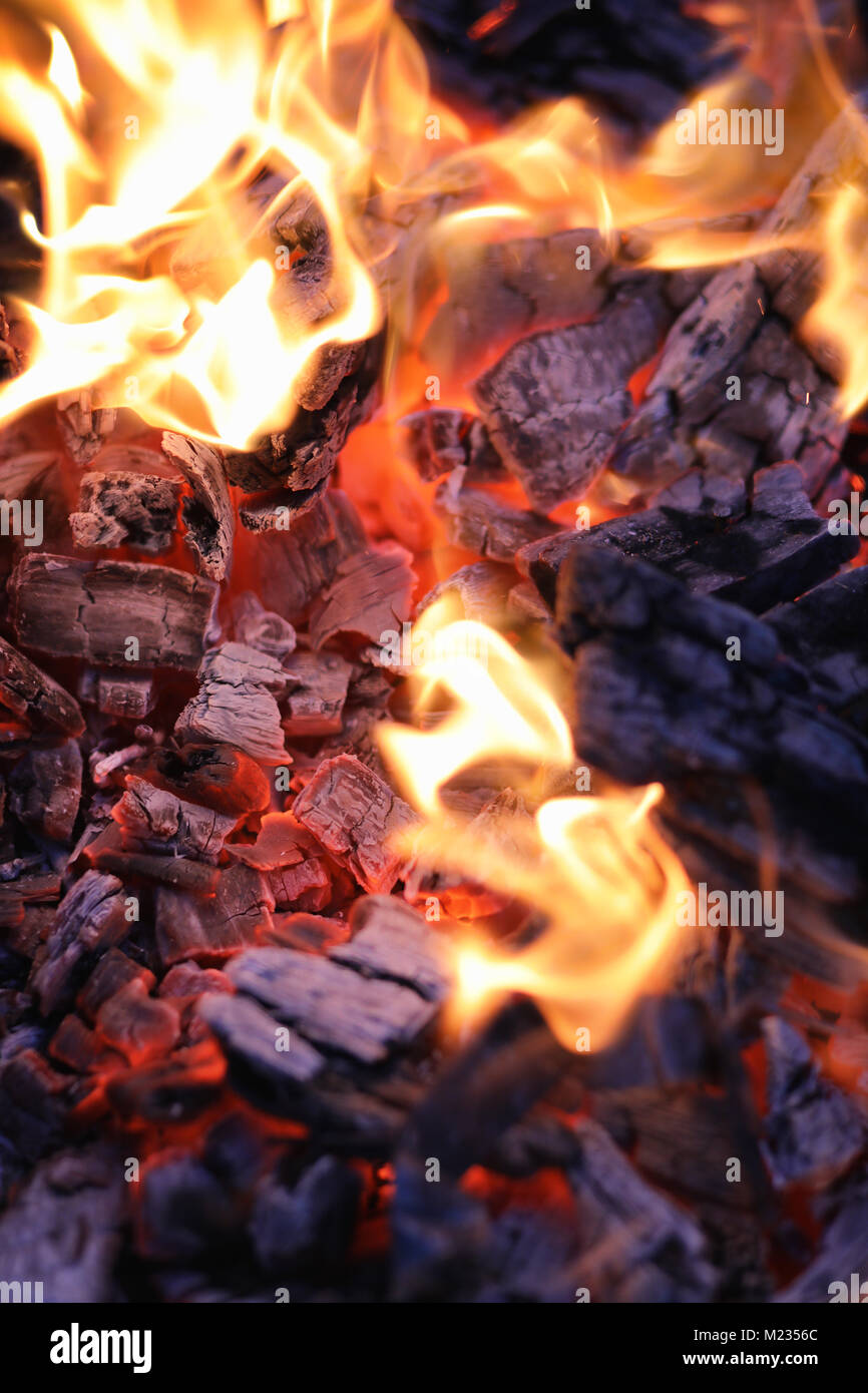 Fire wood coal amber ash closeup Stock Photo