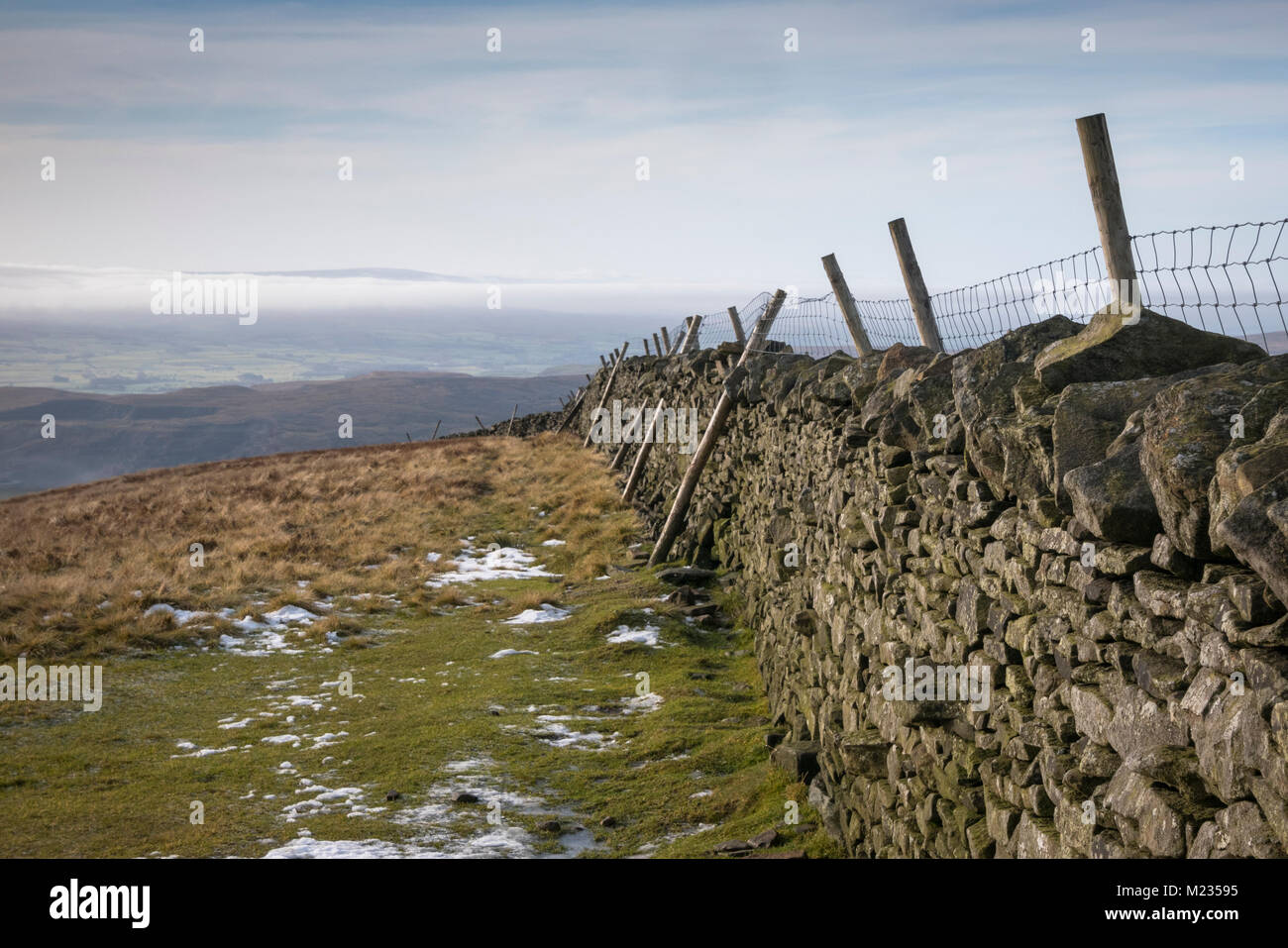 Drystone wall on the summit of Penyghent, one of the Yorkshire Three