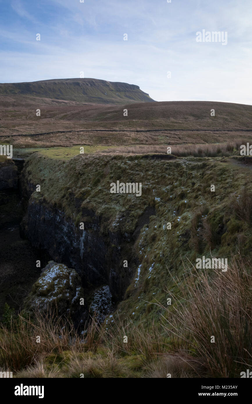 Looking towards Pen-y-ghent over Hull Pot in the Yorkshire Dales. Stock Photo