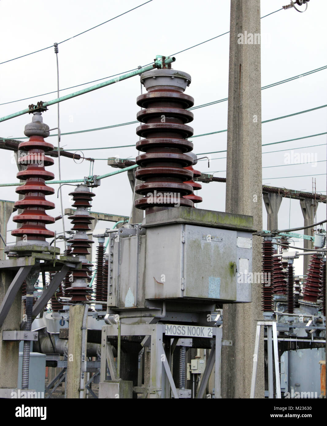 Electricity sub-station showing wires and pylons Stock Photo