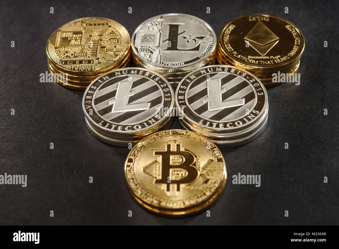 Mix of stack bitcoin, litecoin and ethereum. Cryptocurrency concept Stock Photo