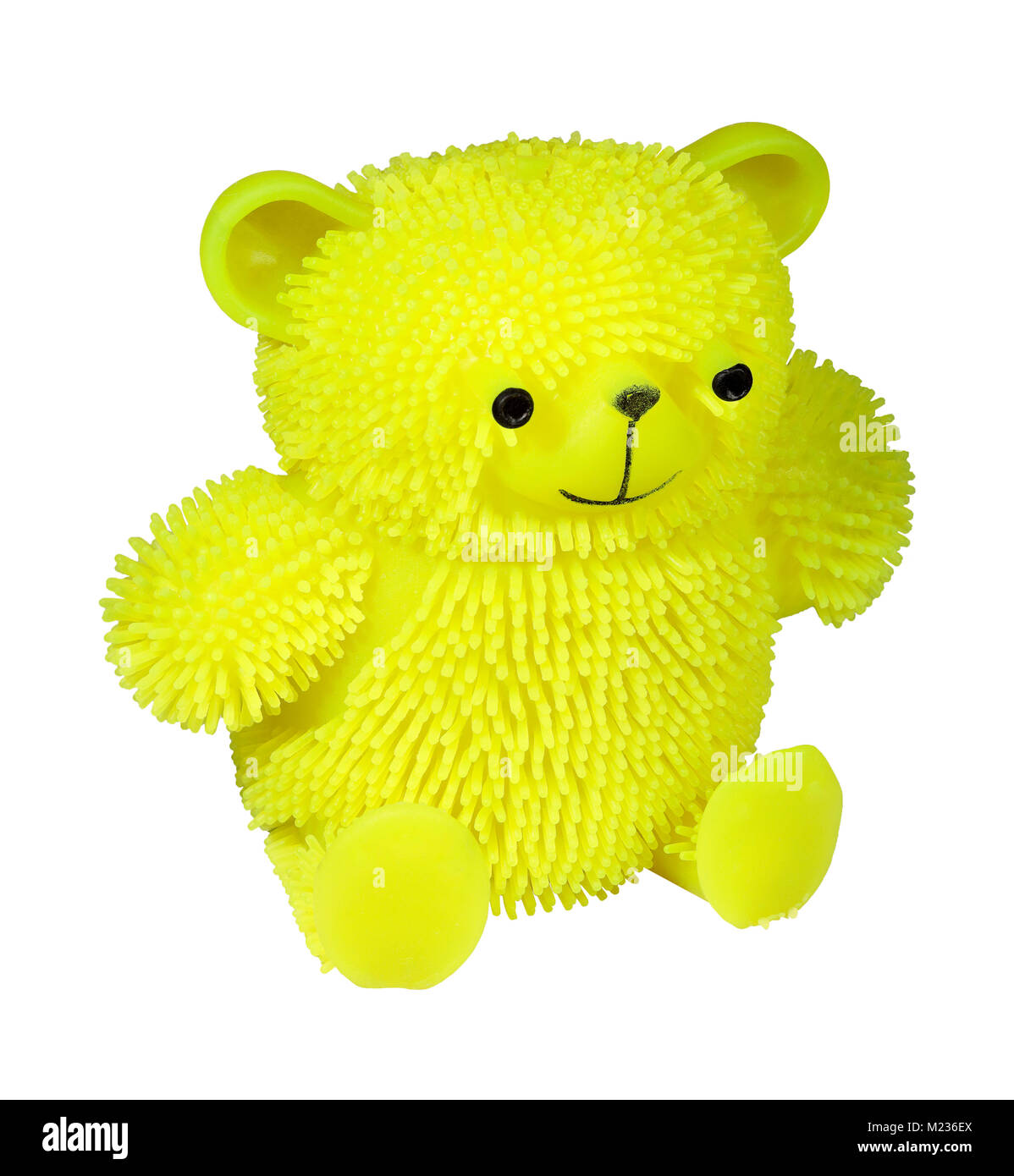 Bright yellow puffer stress ball teddy bear cat toy isolated on a white background Stock Photo