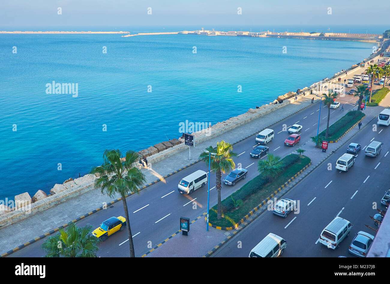 ALEXANDRIA, EGYPT - DECEMBER 18, 2017: Aerial view of morning traffic along the seaside embankment - Corniche avenue, on December 18 in Alexandria. Stock Photo