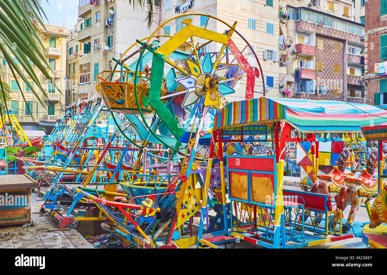 The brightly colored mini ferris wheel and swings in kids' retro luna