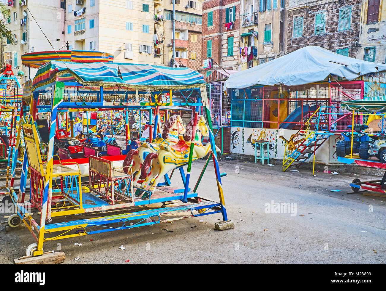 The retro luna park boasts different carousels, swing rides and
