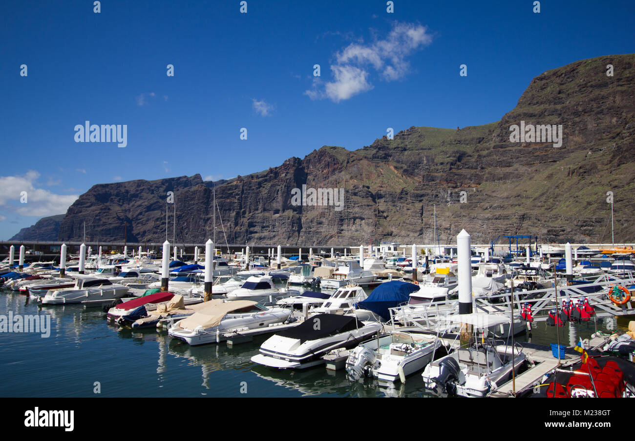 Los gigantes harbour full with a mx of various motor boats Stock Photo