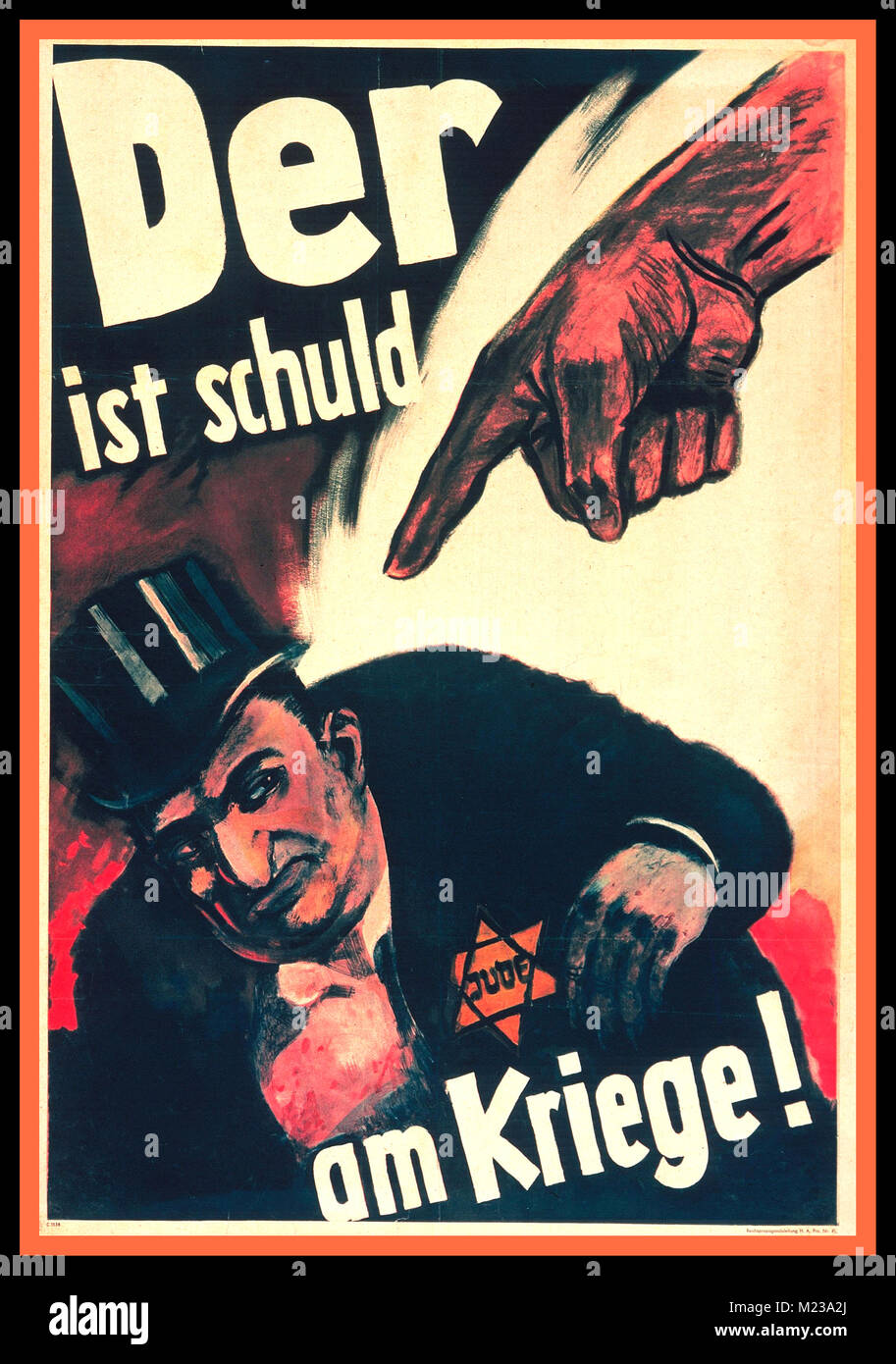 1940’s Nazi Germany anti-Semitic propaganda poster with finger pointing at a Jewish stereotype male banker wearing a Nazi designated Star of David. Anti-semitic racist inflammatory German poster “DER IST SCHULD AM KRIEGE” - The War is his fault ! Stock Photo