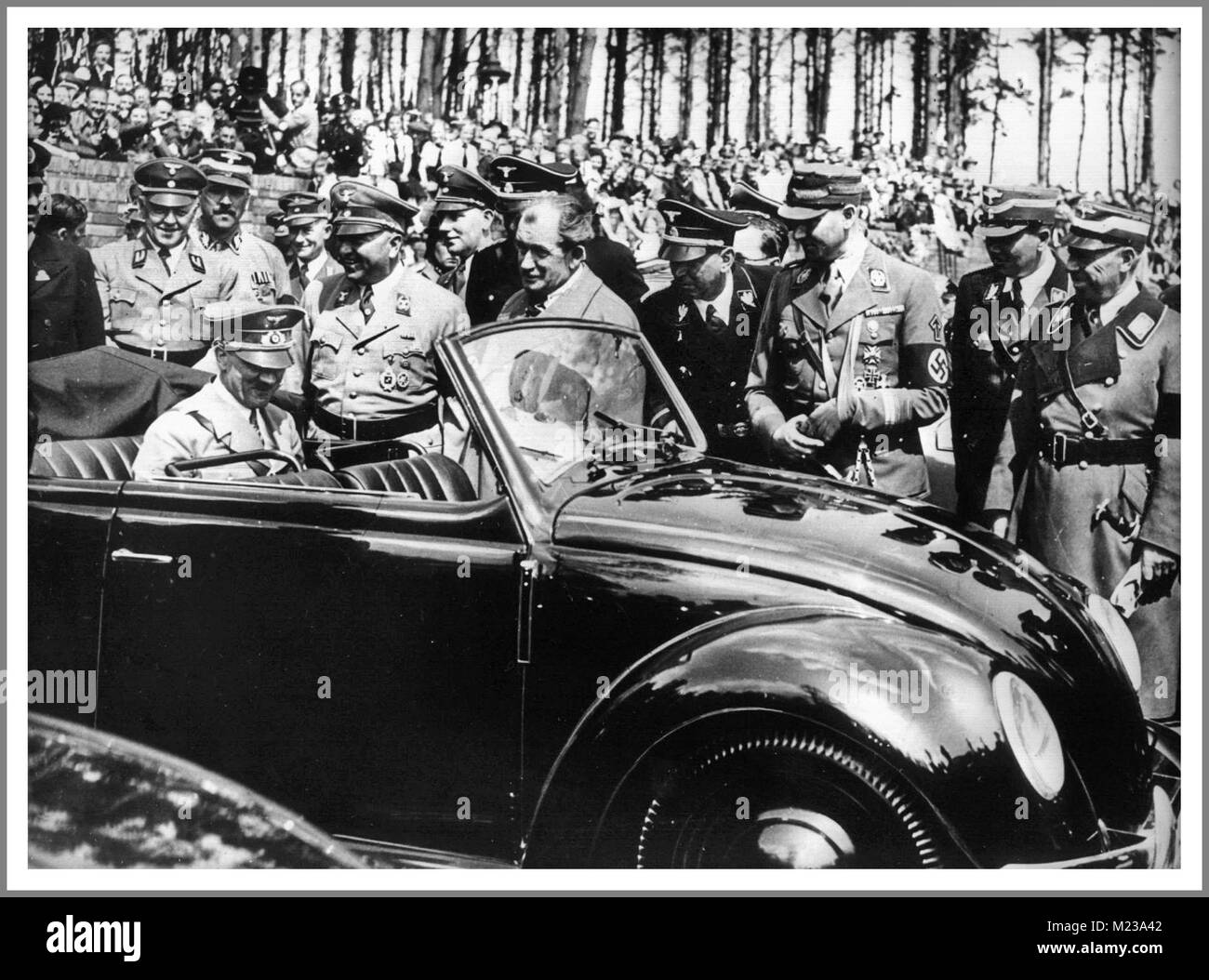 1930's ADOLF HITLER with DR. PORSCHE at the launch of 'the people's car' KDF VW Volkswagen Beetle prototype convertible air-cooled motorcar at Fallersleben Wolfsburg Germany May 1938 Stock Photo