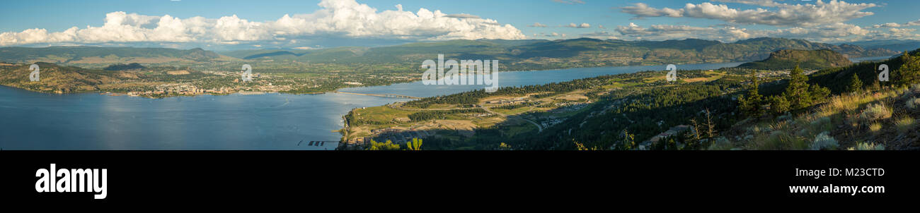 British Columbia, Canada. Panoramic view of the city of Kelowna, and Okanagan Lake and Valley in summer as viewed from West Kelowna. Stock Photo