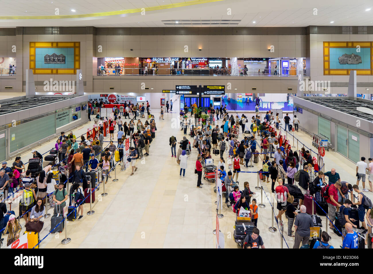 Thailand January 02, 2018 Visitors walking around Departure Hall in