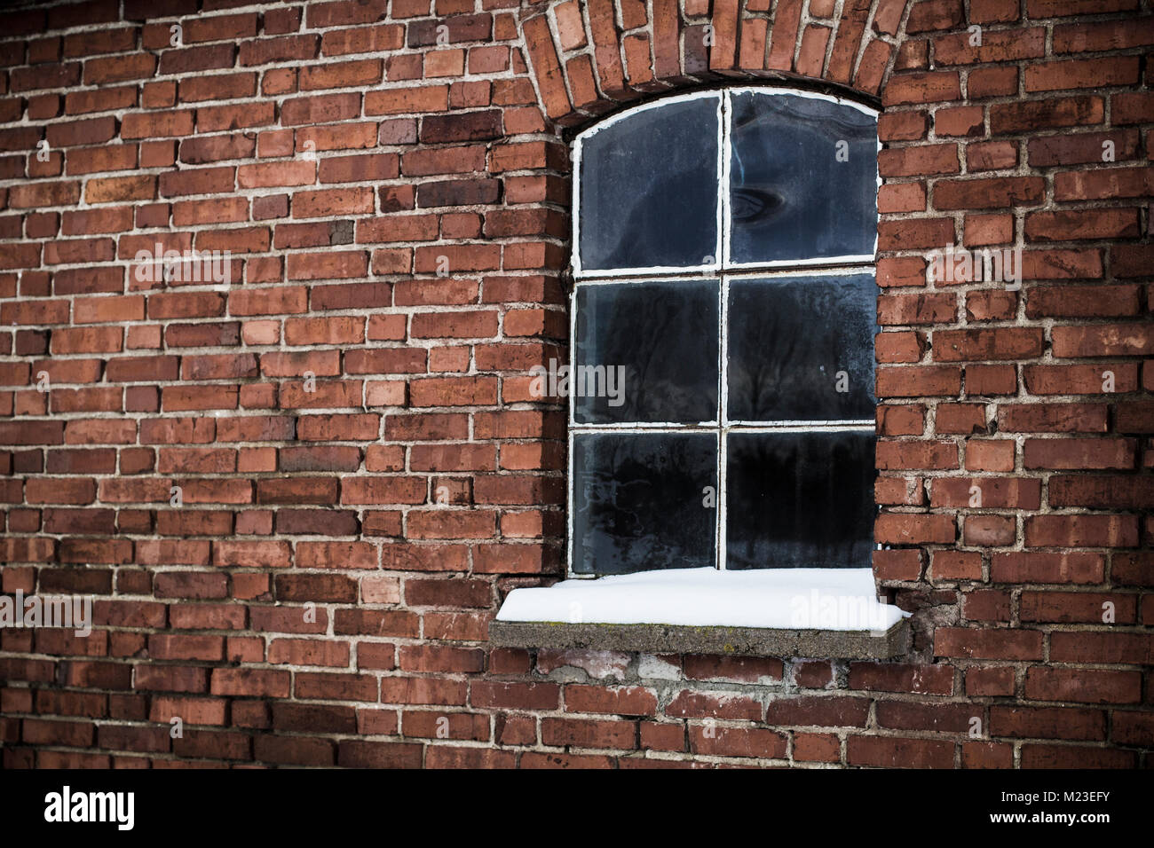 Brick wall with old window Stock Photo - Alamy