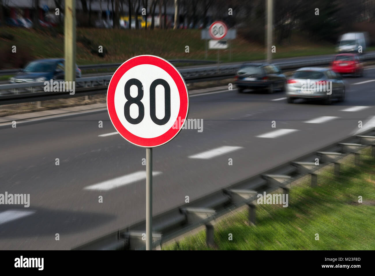 Traffic sign showing speed limit on a highway Stock Photo