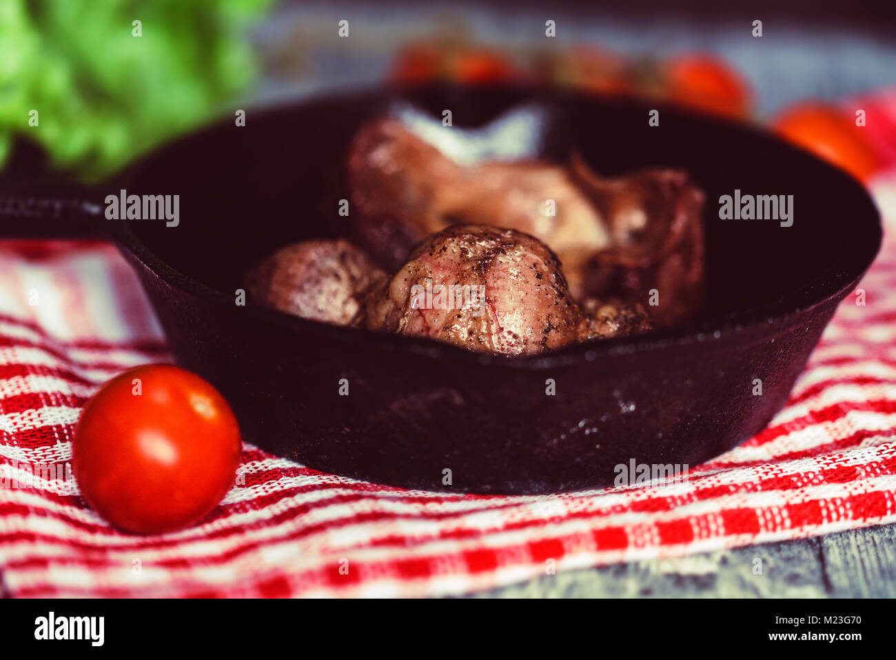 Tasty roasted chicken giblets in pan Stock Photo Alamy