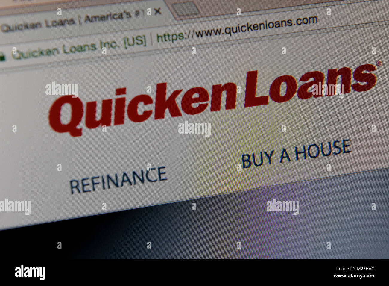 Quicken Loans website seen through a magnifing glass Stock Photo
