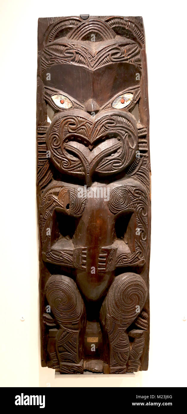 Meeting hose panel, poupou. Maori, North Island of New Zealand. Carved wood and mollusk shell. 19th century. Stock Photo