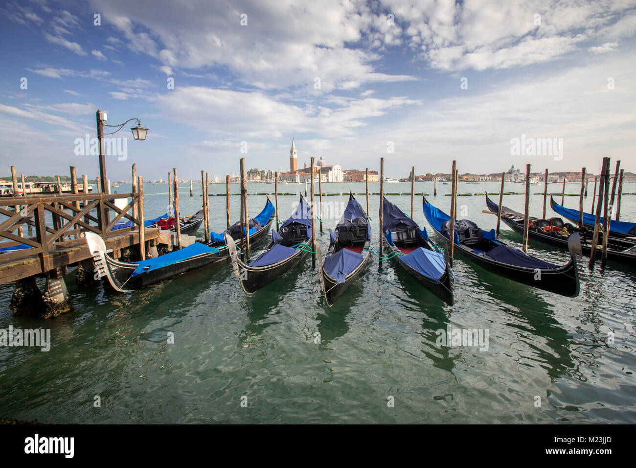 Gondolas at Saint Mark's Square with view of San Giorgio Maggiore island, Venice, Italy Stock Photo