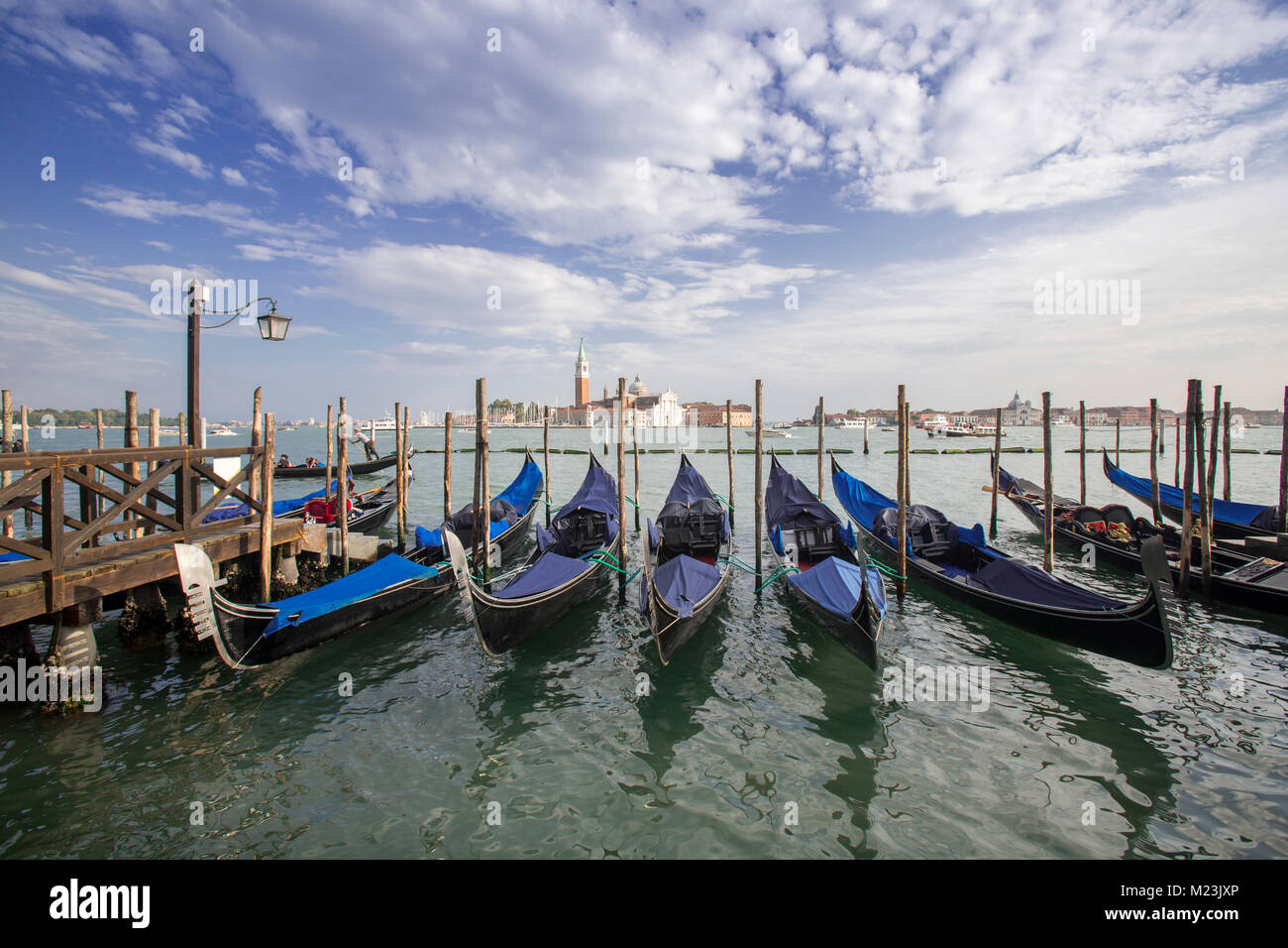 Gondolas at Saint Mark's Square with view of San Giorgio Maggiore island, Venice, Italy Stock Photo