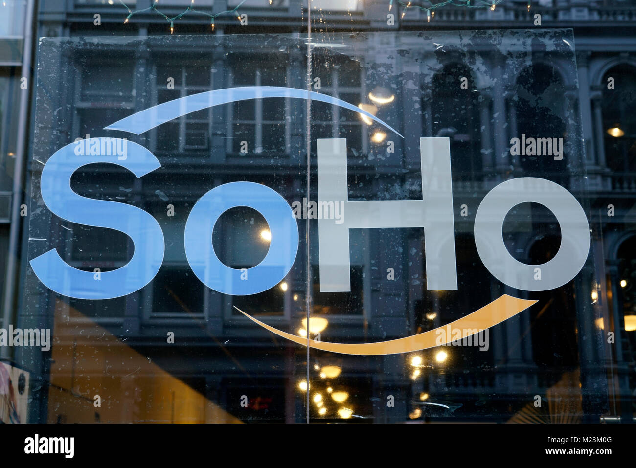 SoHo sign on store window.Soho.Manhattan.New York City.USA Stock Photo