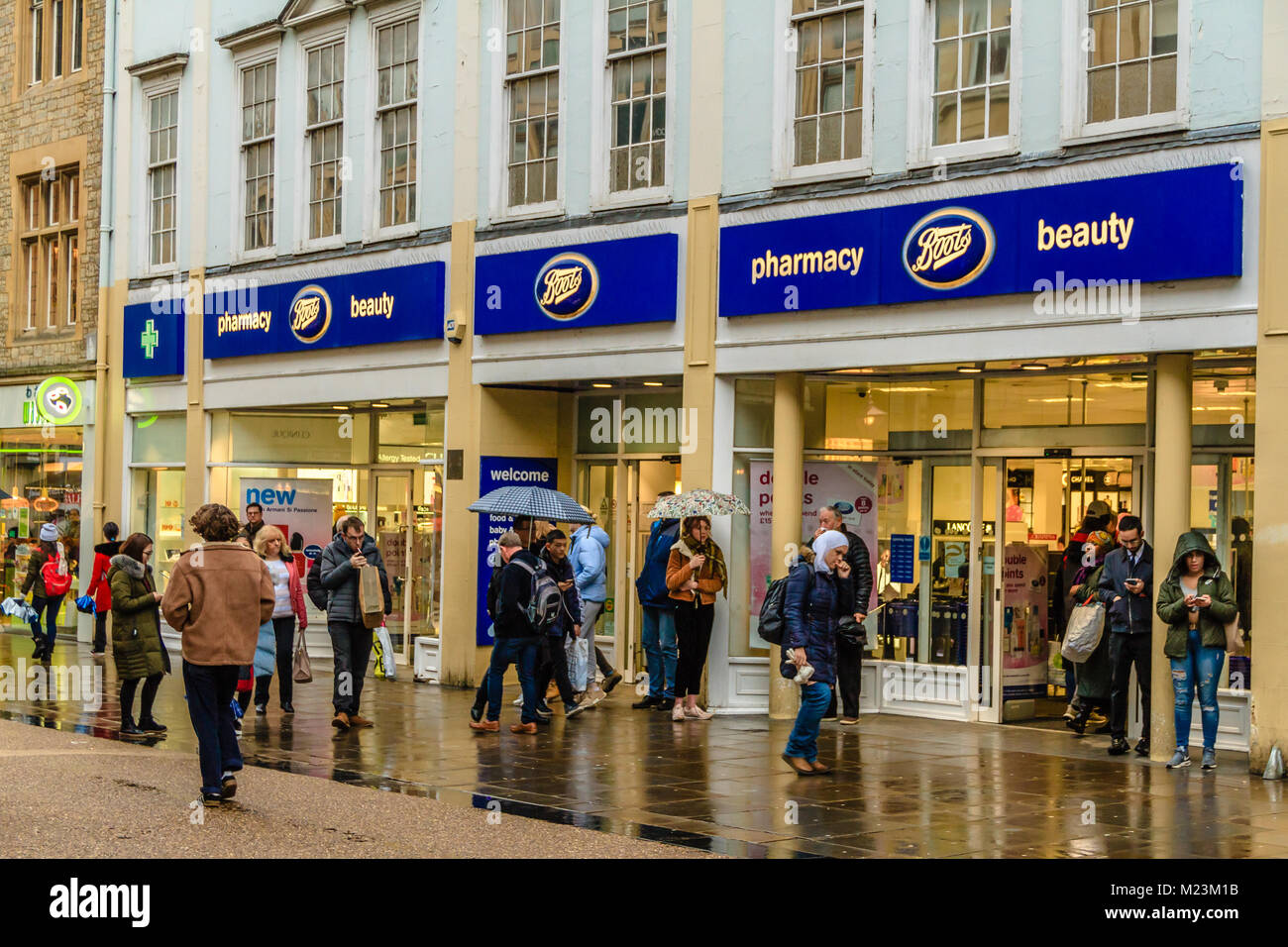 Boots chemist on busy Cornmarket Street, Oxford, Oxfordshire, UK. Feb 2018 Stock Photo