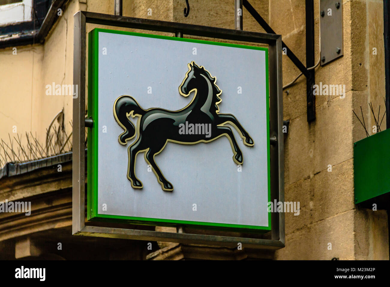 Close up of the black horse logo sign for Lloyds Bank on Cornmarket Street, Oxford, Oxfordshire, UK. Feb 2018 Stock Photo