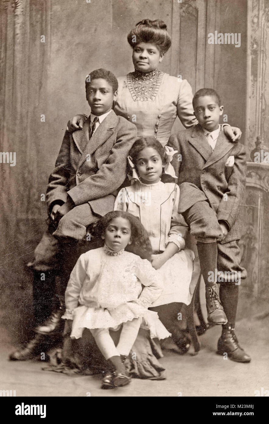 Ida B. Wells-Barnett with her children Charles, Herman, Ida, and Alfreda, 1909.  Ida B. Wells was an African-American journalist, newspaper editor, suffragist, sociologist, feminist. Stock Photo