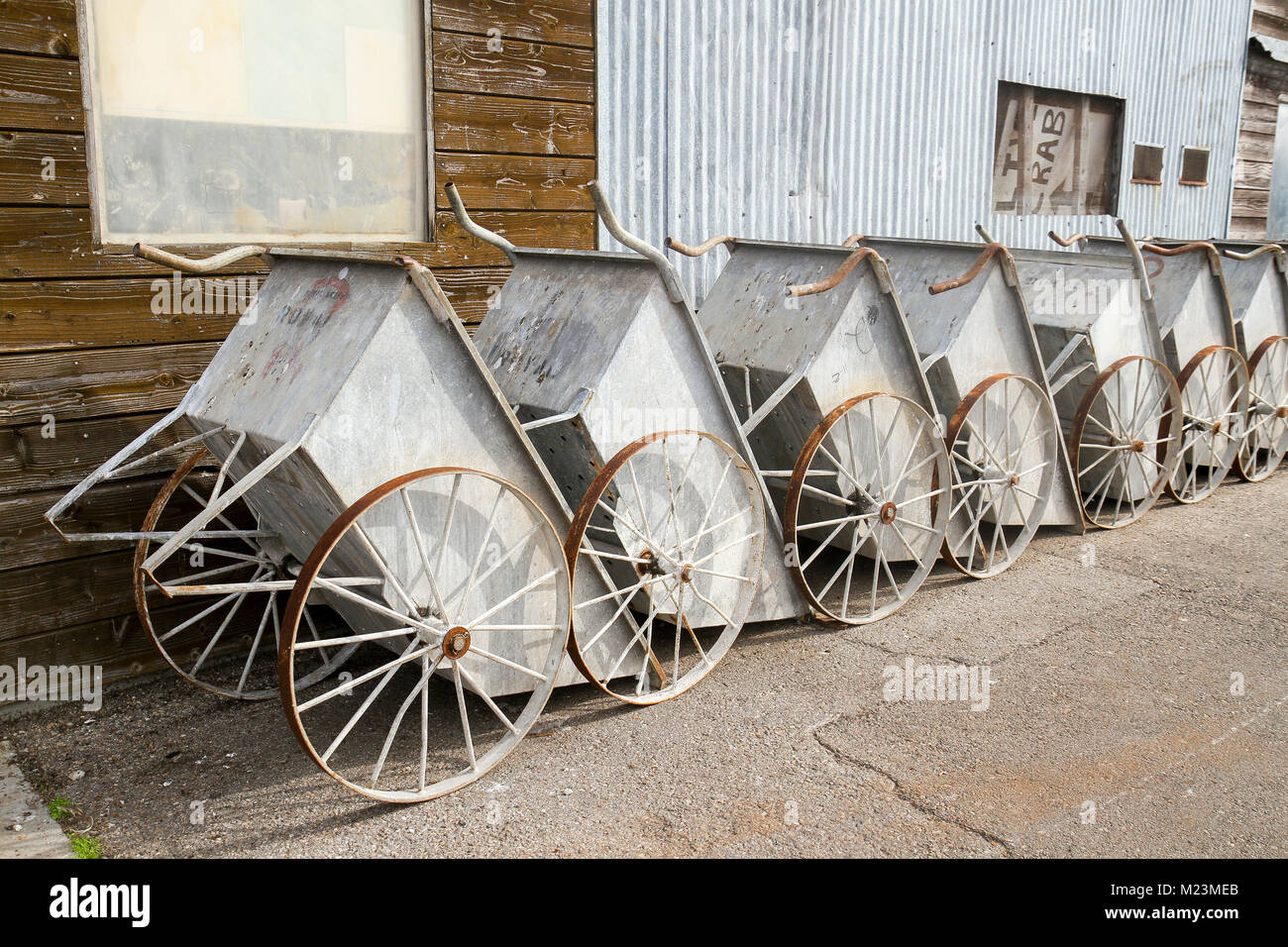 Wheelbarrows lined up on Municipal Wharf II, Monterey, California, United States Stock Photo