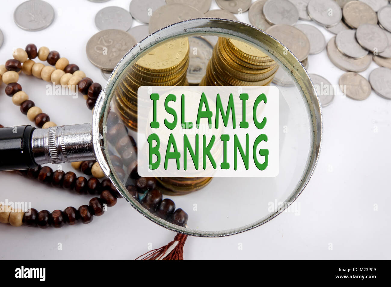 Rosary and coins. Islamic Banking/Finance concept Stock Photo Alamy