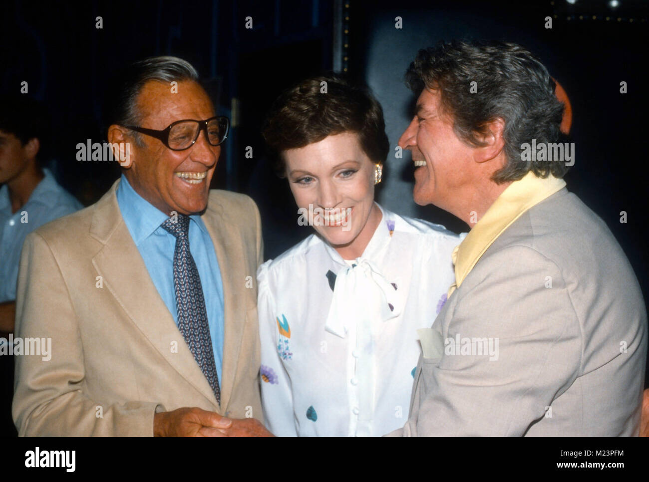 MALIBU, CA - JUNE 26: (L-R) Actor William Holden, actress Julie Andrews and director Blake Edwards attend 'S.O.B.' screening on June 26, 1981 in Malibu, California. Photo by Barry King/Alamy Stock Photo Stock Photo