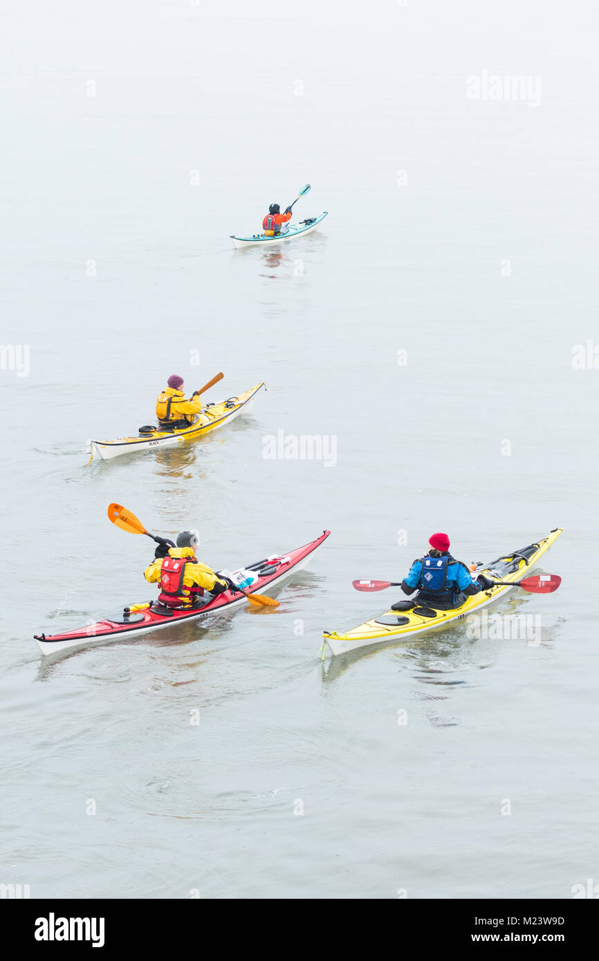 Sea kayaking in winter in Firth of Forth, Fife, Scotland, UK Stock Photo