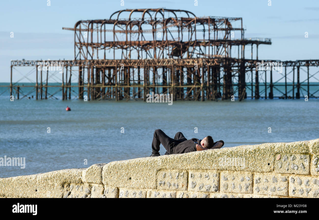 Brighton UK 4th February 2018 - A beautiful sunny day on Brighton beach today with the weather forecast to remain cold over the next few days throughout Britain Photograph taken by Simon Dack Credit: Simon Dack/Alamy Live News Stock Photo