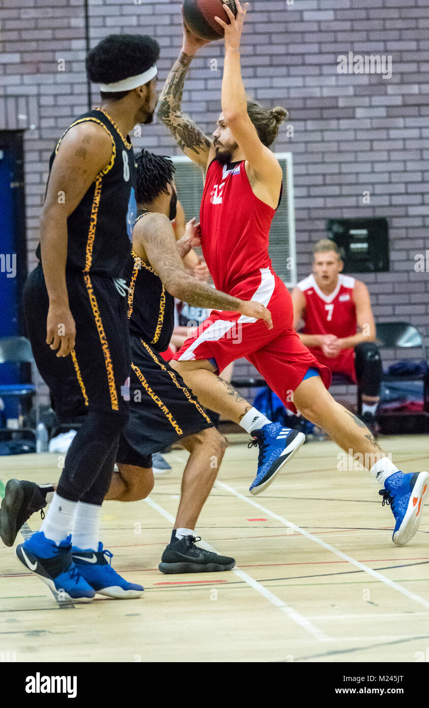 Brentwood, Essex, 4th February 2018 Joe Carter (12) of Sussex Bears, takes on the Essex Leopards defence  at the Basketball match at Brentwood credit Ian Davidson/Alamy Live News Stock Photo