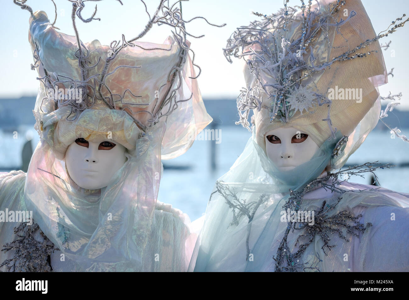 Venice Carnival 2018. After the opening event of the flying angel, Masks posing near Piazza San Marco. Venice, Italy. February 4, 2018. Credit: Gentian Polovina/Alamy Live News Stock Photo