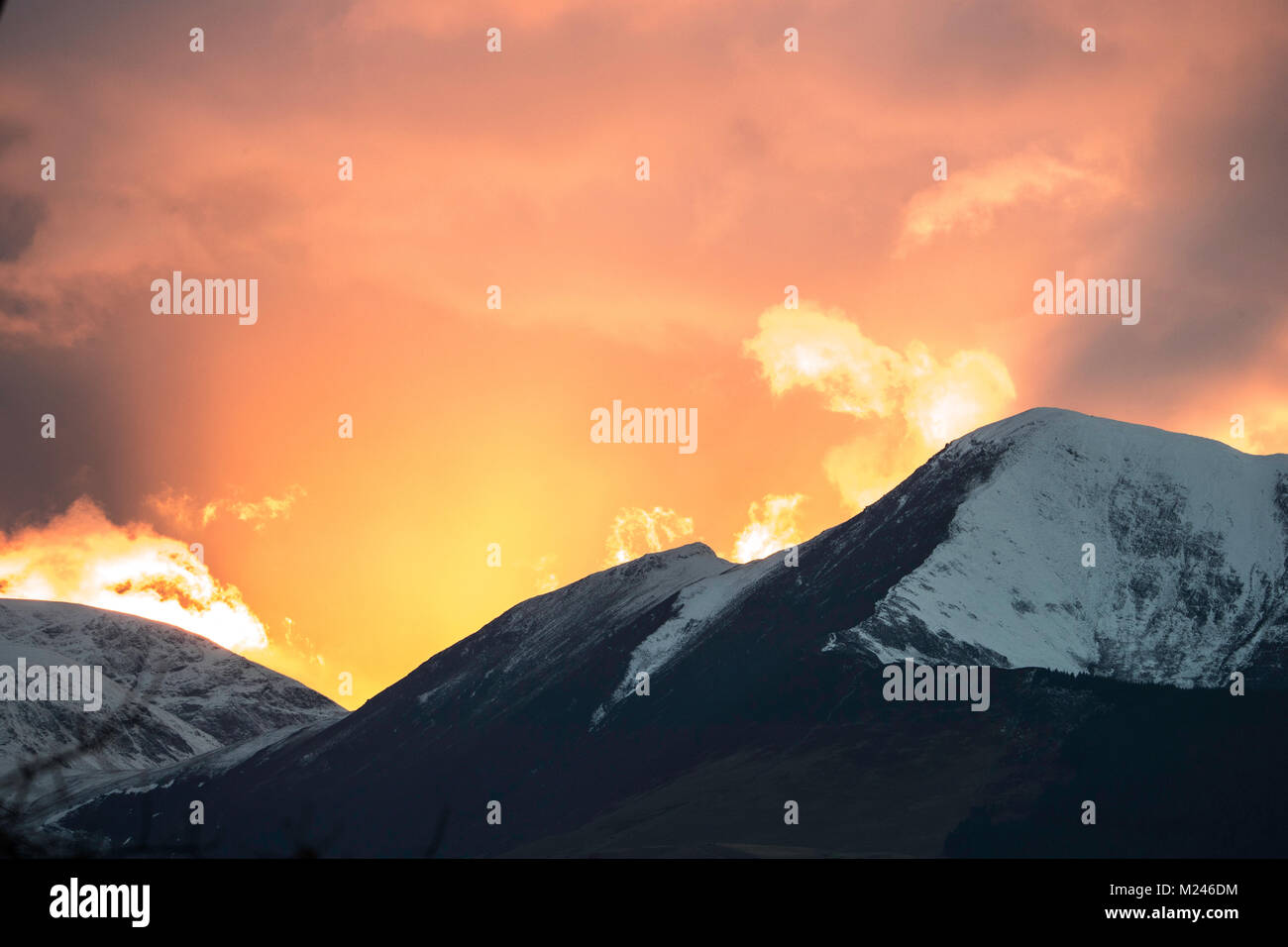 Keswick, UK. 4th February 2018.  Stunning sunset, over Grisedale Pike and the Coledale Horsehoe in England's Lake District National Park.  Russell Millner /  Alamy Live News Stock Photo