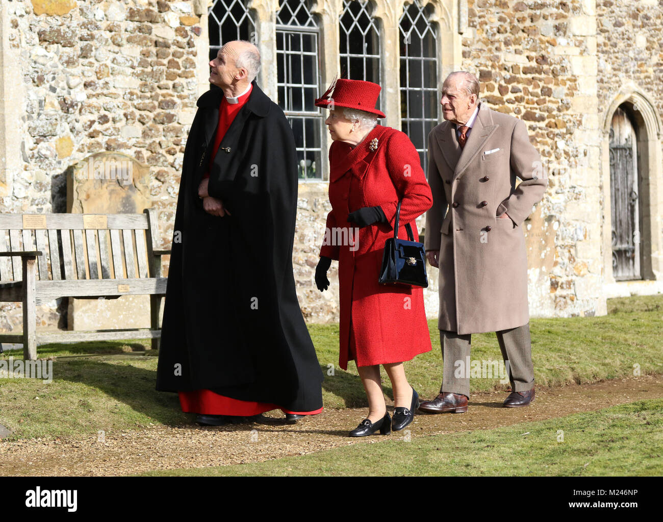 HM Queen Elizabeth II and Prince Philip, Duke of Edinburgh, with Reverend Canon Jonathon Riviere, attending the Sunday morning service at St Peter and St Paul church at West Newton, Norfolk, on February 4, 2018. Credit: Paul Marriott/Alamy Live News Stock Photo