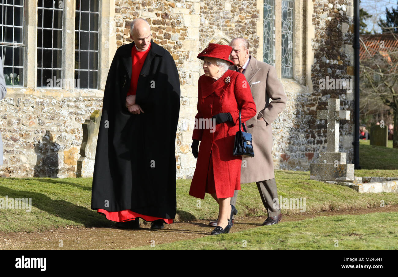 HM Queen Elizabeth II and Prince Philip, Duke of Edinburgh, with Reverend Canon Jonathon Riviere, attending the Sunday morning service at St Peter and St Paul church at West Newton, Norfolk, on February 4, 2018. Credit: Paul Marriott/Alamy Live News Stock Photo
