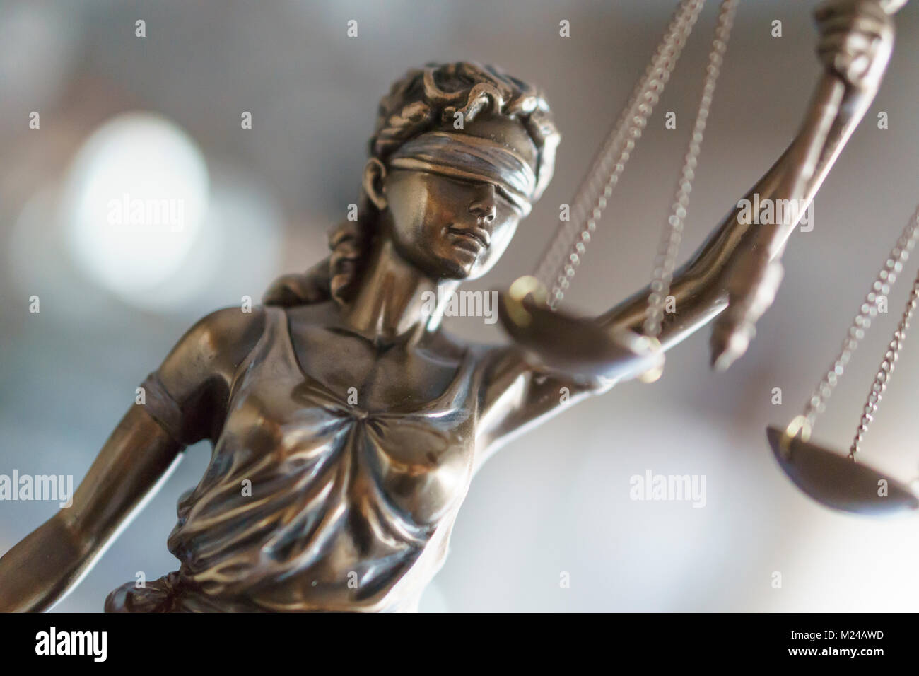 Statue of Justice with scales in lawyer office. Legal law, advice and justice concept Stock Photo