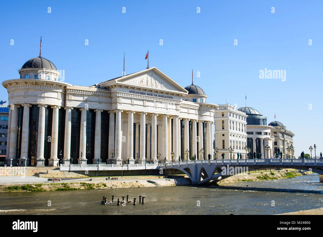 SKOPJE, MACEDONIA - OCTOBER 12, 2017: Macedonia square in Skopje city with Archeological museum and monuments on a sunny day Stock Photo