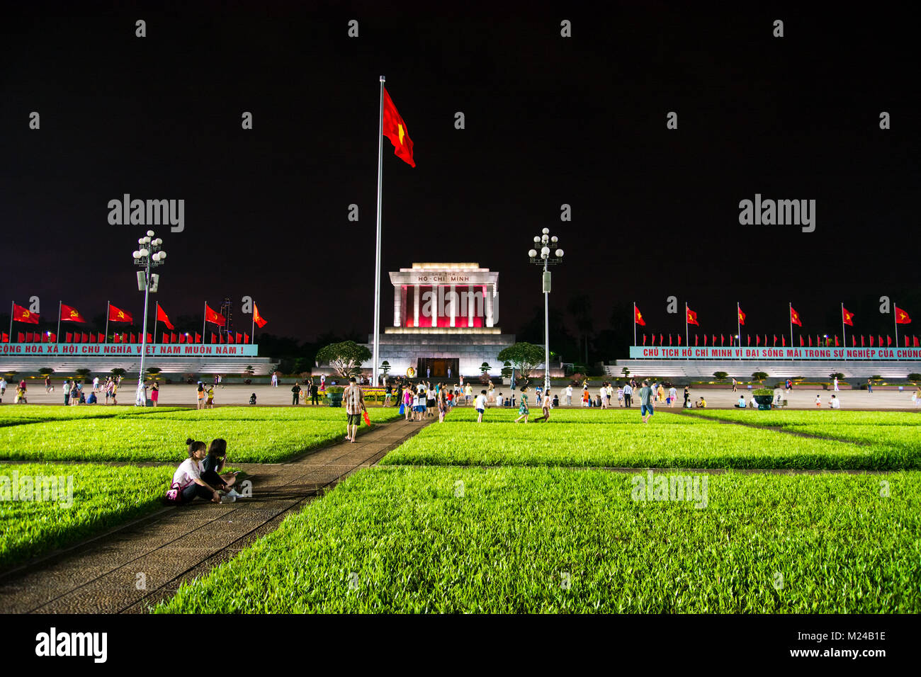 HANOI, VIETNAM - MAY 22, 2017: Ba Dình Square crowded with visitors and Ho Chi Minh Mausoleum in Hanoi Vietnam at night. On this place president Ho Ch Stock Photo