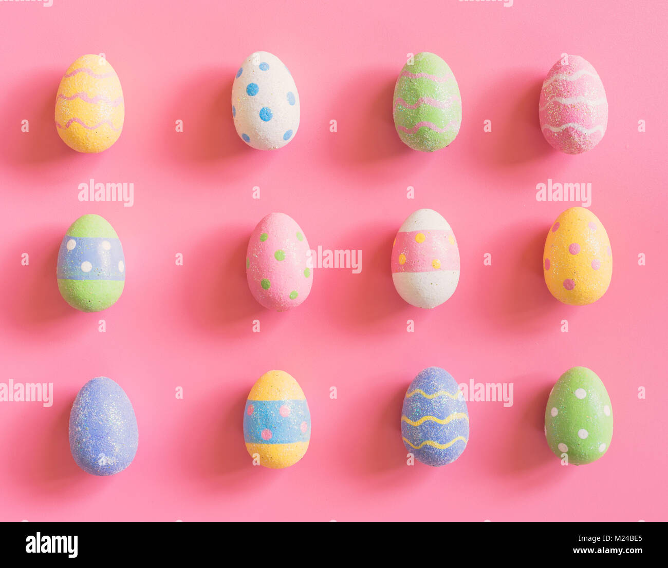Colorful easter eggs on pink pastel color background with space Stock ...