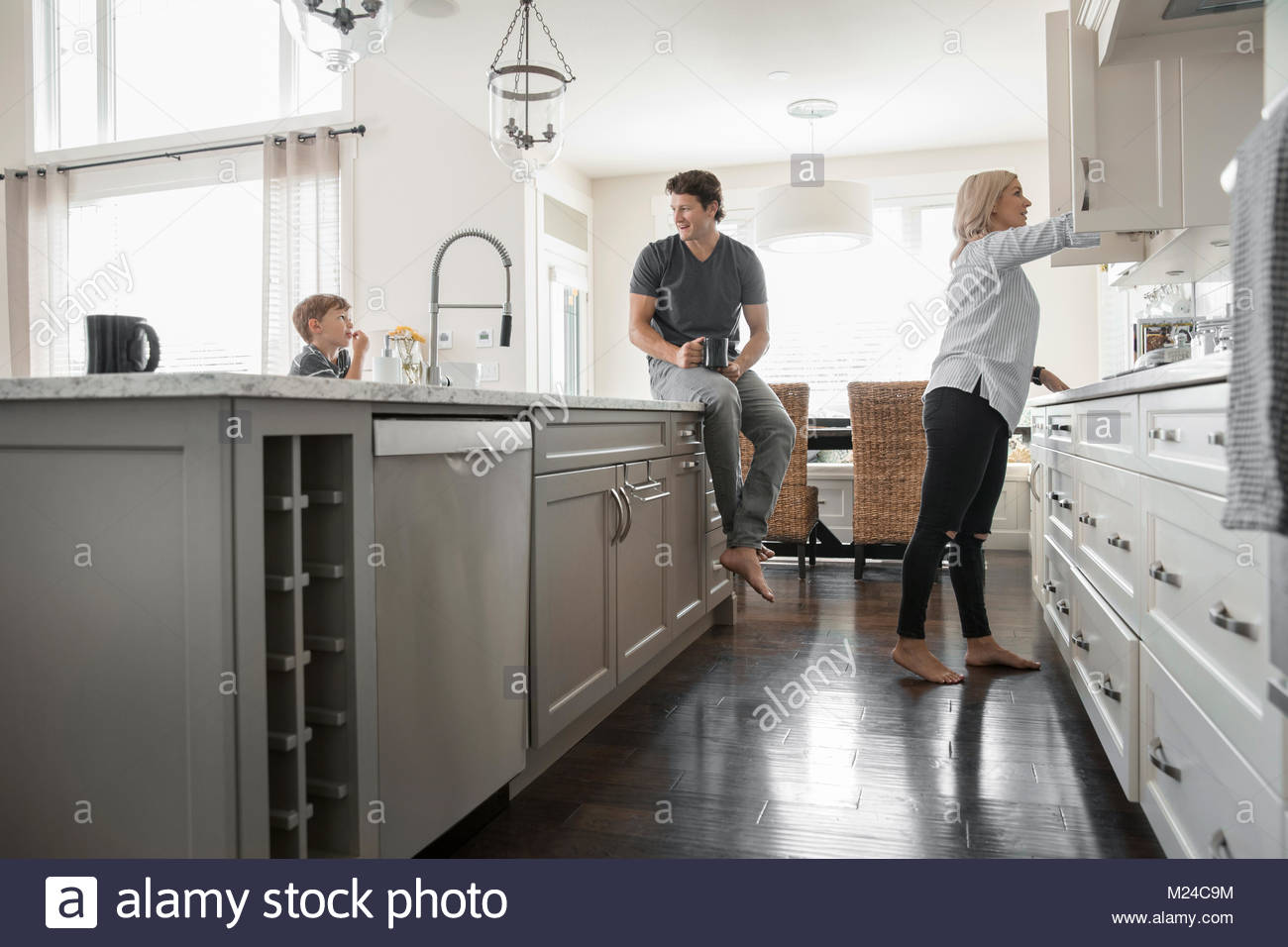Family sitting together kitchen hires stock photography and images Alamy