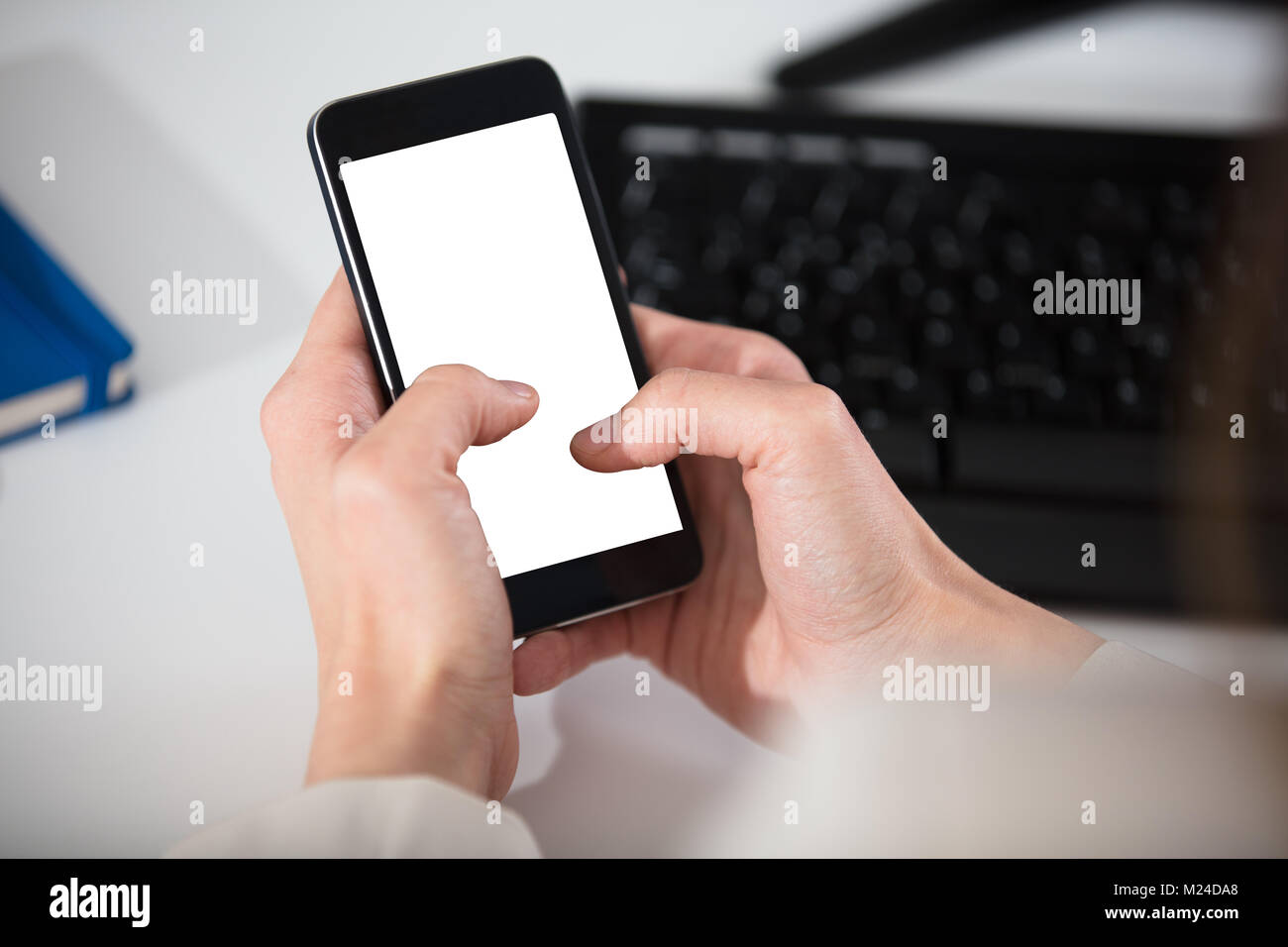 Close-up Of A Person's Hand Holding Smart Phone With Blank White Screen ...