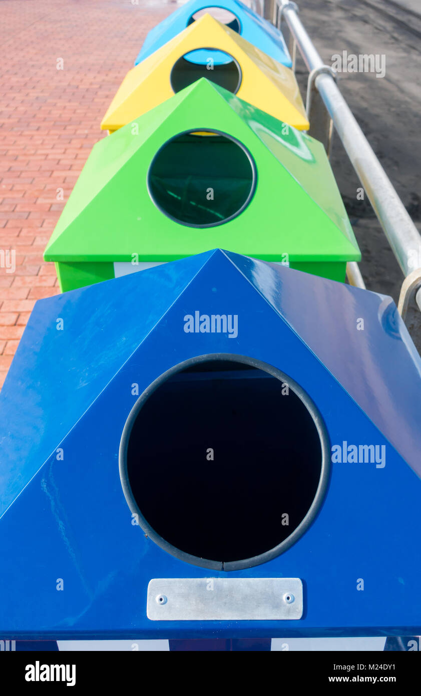 Colour coded waste bins for recycling plastic, paper, organic...on beach in Spain Stock Photo