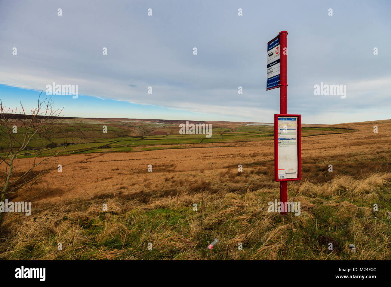 Isolated bus stop on a bleak moorland road on Keighley Road, West