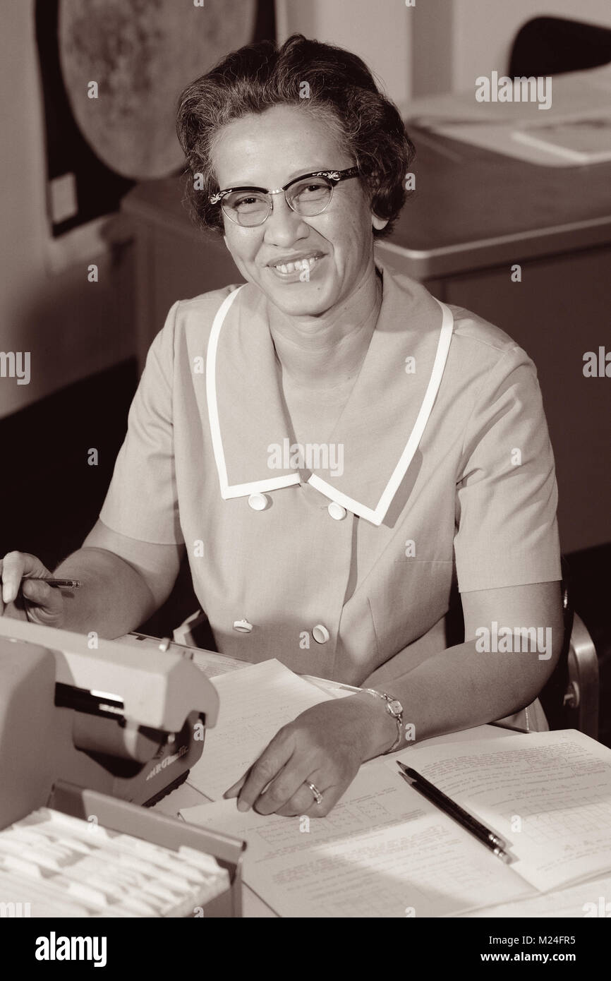 Katherine Johnson, one of NASA's 'human computers' featured in the film Hidden Figures, at her desk in 1962 at NASA Langley Research Center where she performed the complex calculations that enabled humans to successfully achieve space flight. Stock Photo
