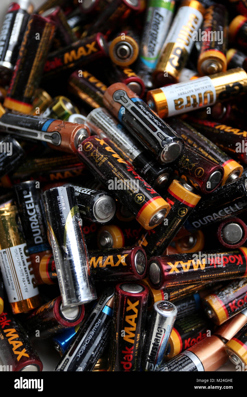 A collection of old AA batteries in a box in London, UK Stock Photo - Alamy