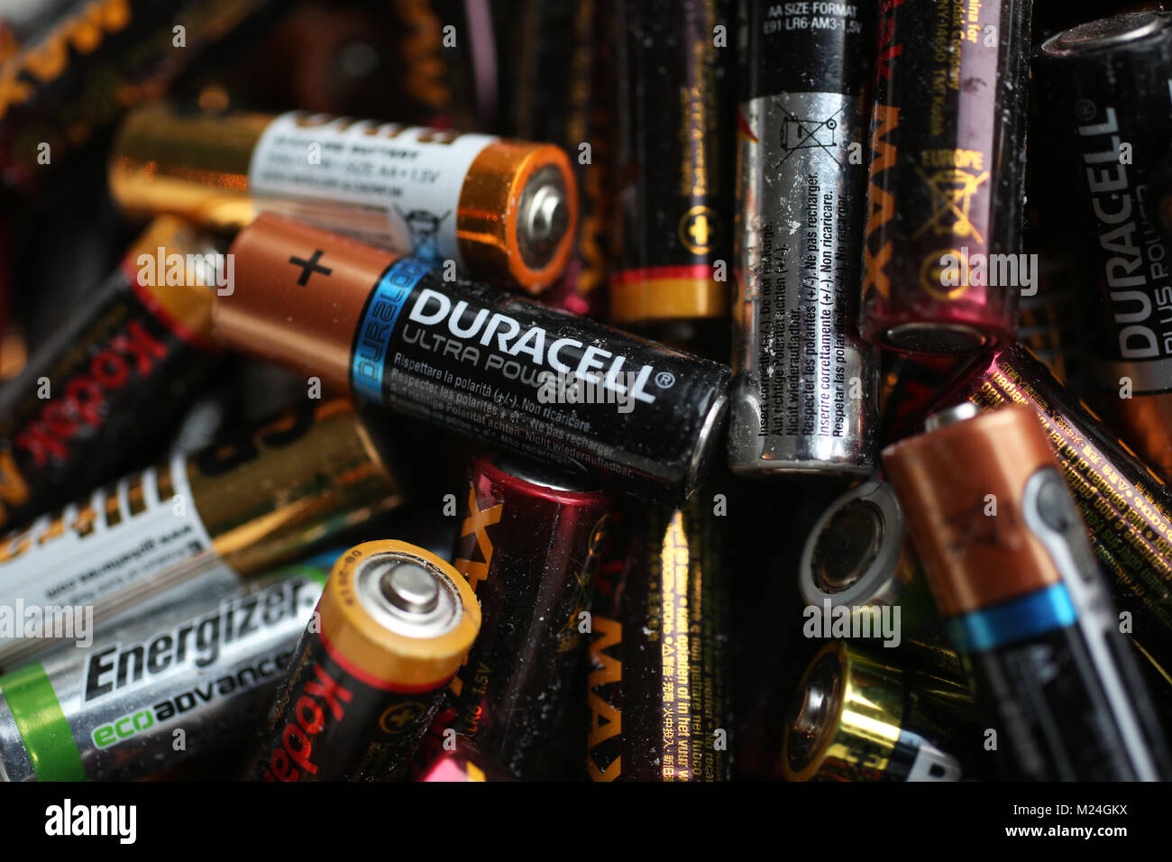 A collection of old AA batteries in a box in London, UK Stock Photo Alamy