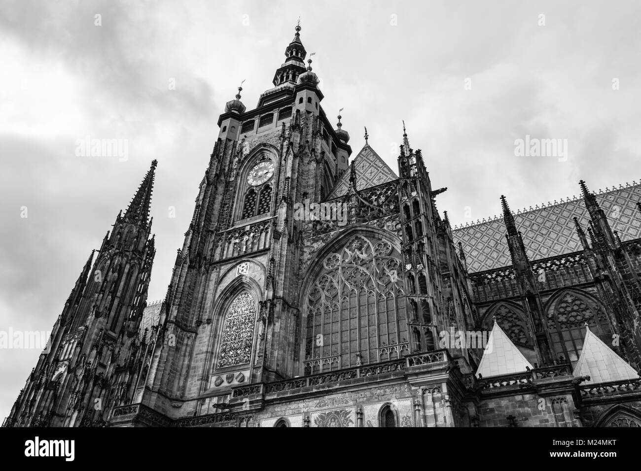 Prague, Czech Republic: Black and white view of the clock tower of  the metropolitan Cathedral of Saint Vitus, Wenceslaus and Adalbert Stock Photo