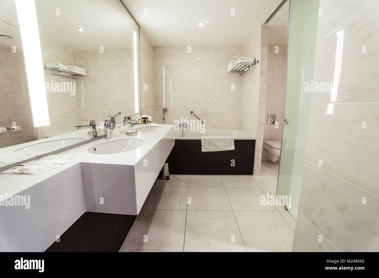 designer bathroom with shower tiling Stock Photo Alamy